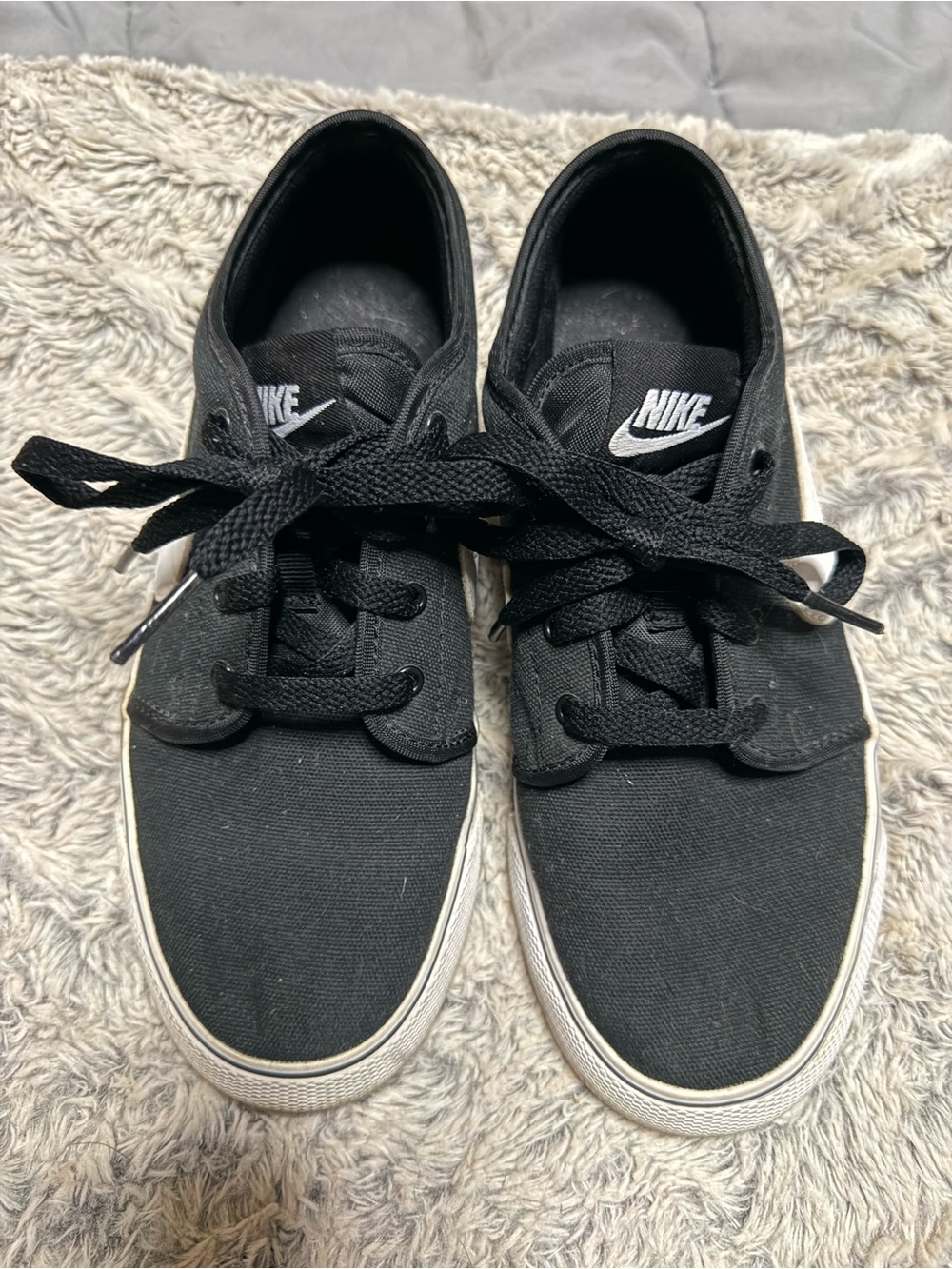 Nike Unisex Black Canvas Sneakers with White Swoosh